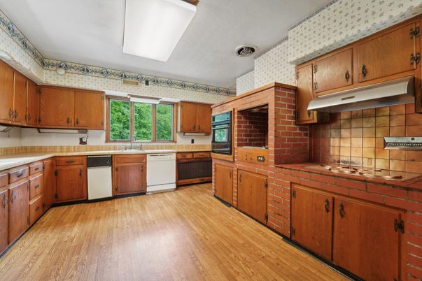Interior, Kitchen, Stone Walls, Tile Countertops, Wood Texture Flooring