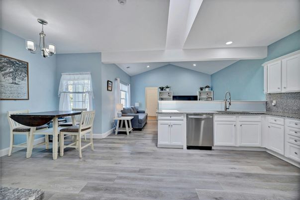 Chandelier, Dining room, Interior, Kitchen, Pendant Lights, Recessed Lighting, Stainless Steel Appliances, Wood Texture Flooring