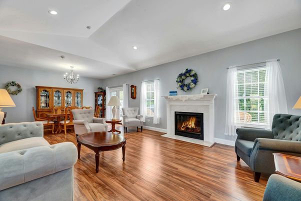 Chandelier, Dining room, Fireplace, Interior, Living room, Recessed Lighting, Wood Texture Flooring