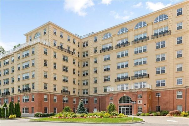 Exterior, Facade, Brick Facade, Condo Building