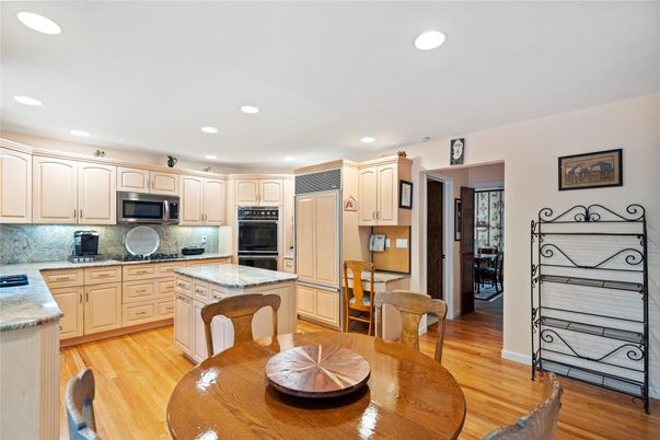 Dining room, Interior, Kitchen, Recessed Lighting, Stainless Steel Appliances, Wood Texture Flooring