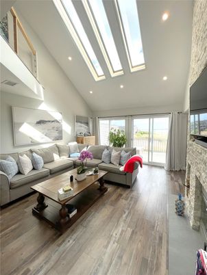 Fireplace, Glass Ceilings, Interior, Living room, Recessed Lighting, Wood Texture Flooring