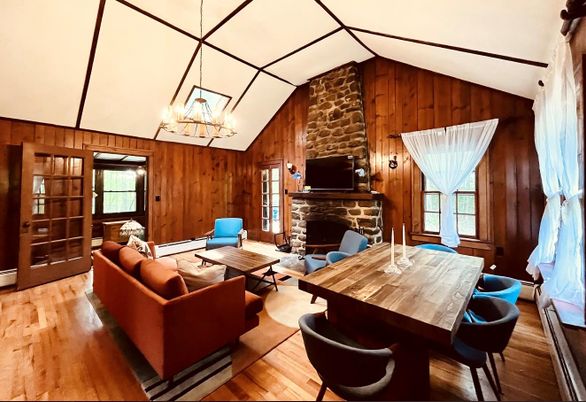 Dining room, Fireplace, Interior, Living room, Pendant Lights, Stone Walls, Wood Texture Flooring, Wooden Walls