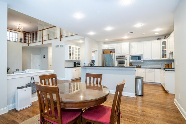 Dining room, Interior, Kitchen, Recessed Lighting, Stainless Steel Appliances, Wood Texture Flooring