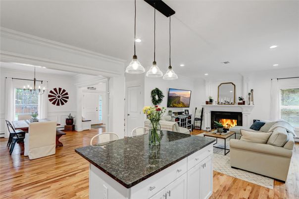 Dining room, Fireplace, Interior, Living room, Pendant Lights, Recessed Lighting, Wood Texture Flooring