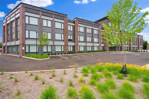Exterior, Facade, Brick Facade, Condo Building