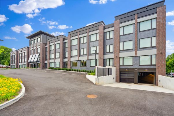 Attached, Exterior, Facade, Brick Facade, Condo Building