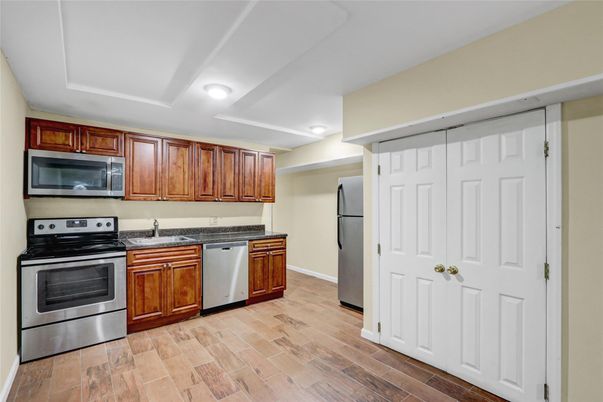 Interior, Kitchen, Recessed Lighting, Stainless Steel Appliances, Wood Texture Flooring