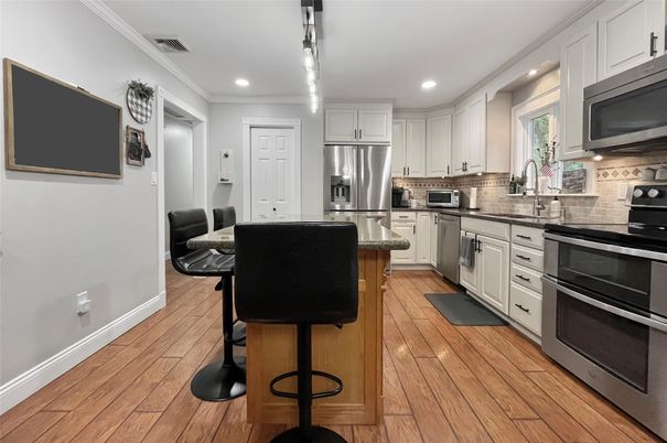 Interior, Kitchen, Recessed Lighting, Stainless Steel Appliances, Wood Texture Flooring
