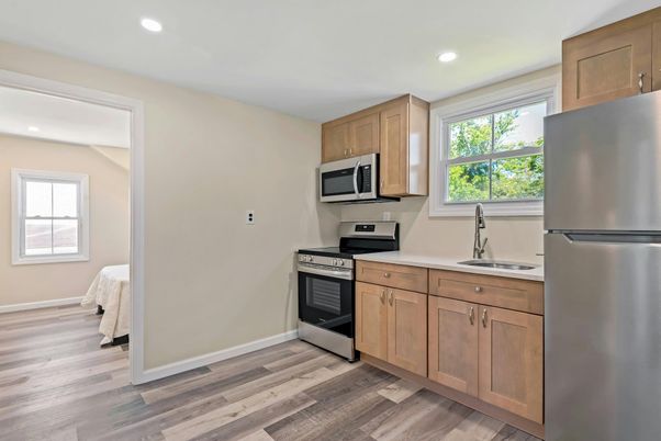 Interior, Kitchen, Recessed Lighting, Stainless Steel Appliances, Wood Texture Flooring