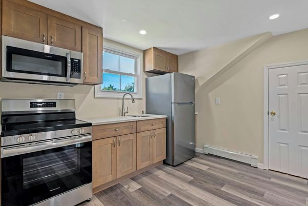 Interior, Kitchen, Recessed Lighting, Stainless Steel Appliances, Wood Texture Flooring