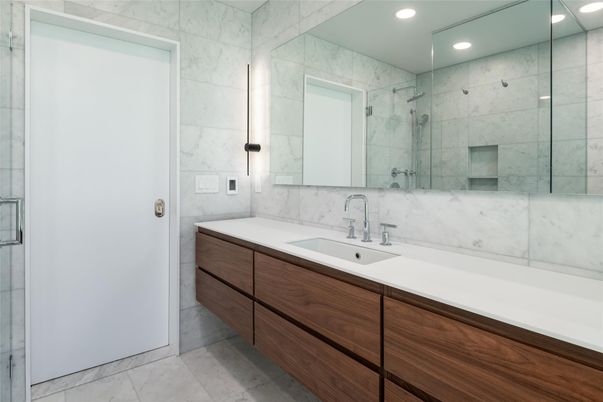 Bathroom, Dual Sink Vanities, Glass Shower, Interior, Marble Walls, Recessed Lighting