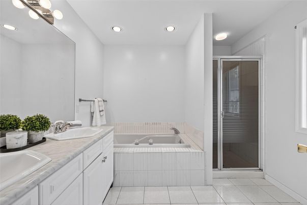 Bathroom, Dual Sink Vanities, Glass Shower, Interior, Recessed Lighting, Tile Countertops