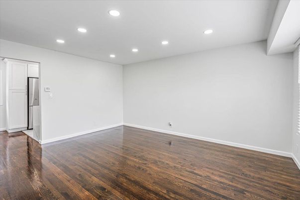 Empty room, Interior, Recessed Lighting, Stainless Steel Appliances, Wood Texture Flooring