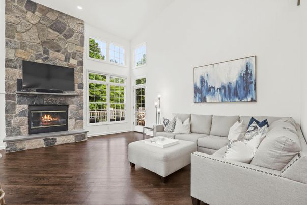 Fireplace, Interior, Living room, Recessed Lighting, Stone Walls, Wood Texture Flooring
