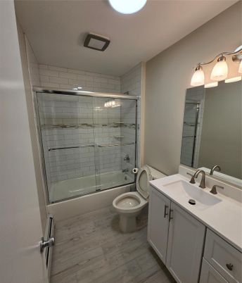 Bathroom, Glass Shower, Interior, Recessed Lighting, Wood Texture Flooring