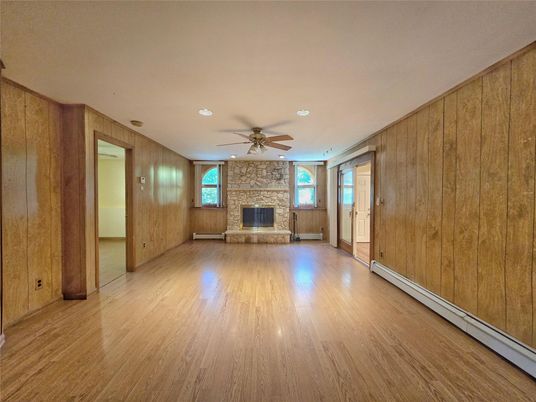 Empty room, Fireplace, Interior, Recessed Lighting, Wood Texture Flooring, Wooden Walls