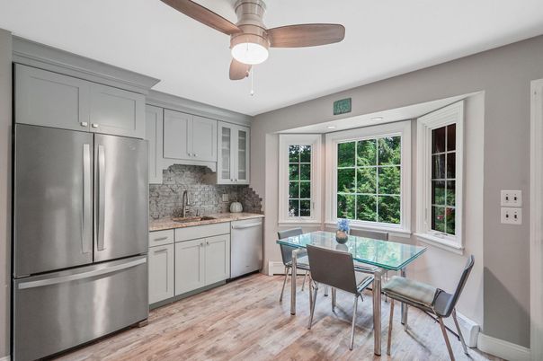 Dining room, Interior, Kitchen, Recessed Lighting, Stainless Steel Appliances, Wood Texture Flooring