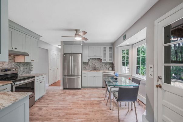 Dining room, Interior, Kitchen, Recessed Lighting, Stainless Steel Appliances, Wood Texture Flooring