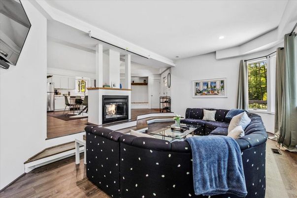 Dining room, Fireplace, Interior, Living room, Recessed Lighting, Wood Texture Flooring