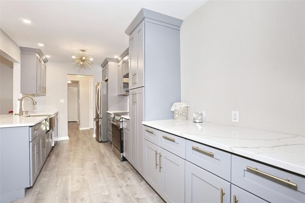 Interior, Kitchen, Pendant Lights, Recessed Lighting, Stainless Steel Appliances, Wood Texture Flooring
