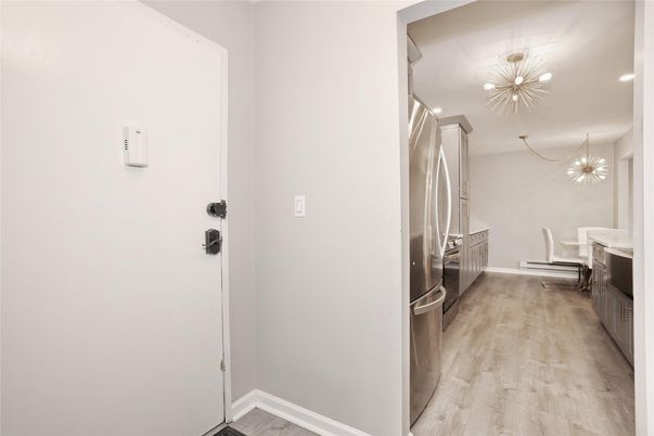 Chandelier, Interior, Pendant Lights, Recessed Lighting, Stainless Steel Appliances, Wood Texture Flooring