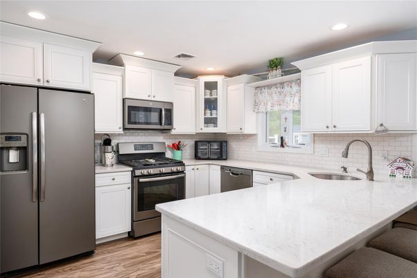 Interior, Kitchen, Recessed Lighting, Stainless Steel Appliances, Wood Texture Flooring