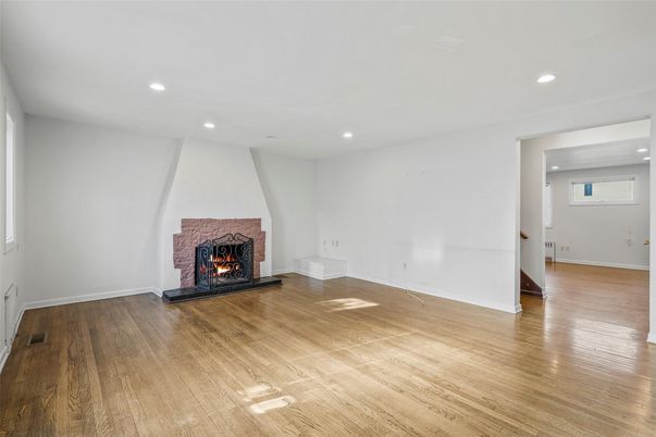 Empty room, Fireplace, Interior, Recessed Lighting, Wood Texture Flooring