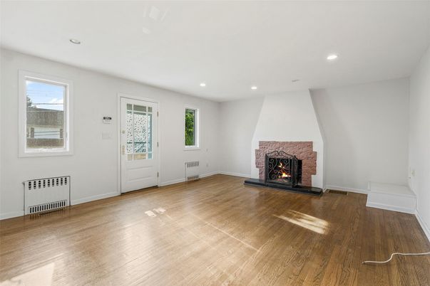 Empty room, Fireplace, Interior, Recessed Lighting, Wood Texture Flooring