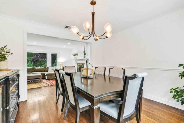 Dining room, Fireplace, Interior, Living room, Recessed Lighting, Wood Texture Flooring