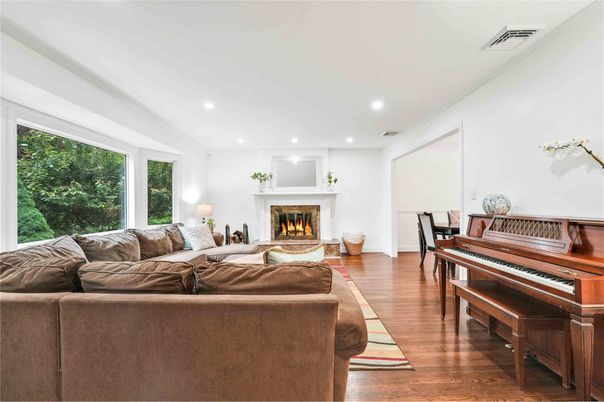Fireplace, Interior, Living room, Piano, Recessed Lighting, Wood Texture Flooring