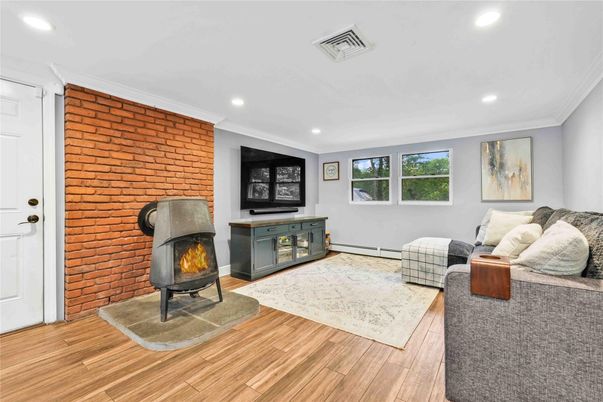 Fireplace, Interior, Recessed Lighting, Stone Walls, Wood Texture Flooring