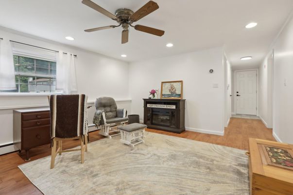Fireplace, Home Office, Interior, Recessed Lighting, Wood Texture Flooring