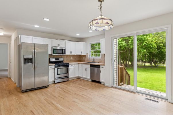 Interior, Kitchen, Pendant Lights, Recessed Lighting, Stainless Steel Appliances, Wood Texture Flooring