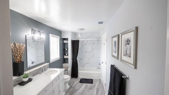 Bathroom, Dual Sink Vanities, Interior, Marble Walls, Wood Texture Flooring