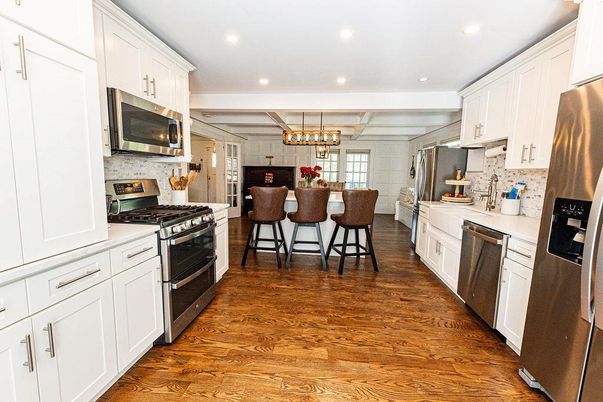 Chandelier, Dining room, Interior, Kitchen, Pendant Lights, Recessed Lighting, Stainless Steel Appliances, Wood Texture Flooring