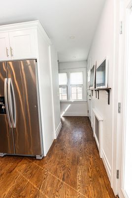 Fireplace, Interior, Kitchen, Recessed Lighting, Stainless Steel Appliances, Wood Texture Flooring
