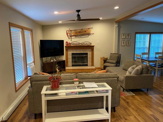 Dining room, Fireplace, Interior, Living room, Recessed Lighting, Wood Texture Flooring
