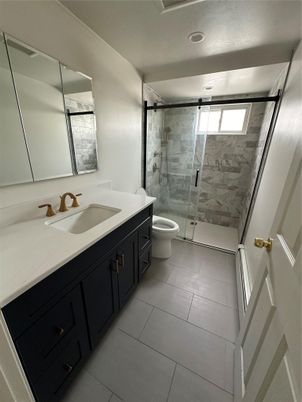 Bathroom, Dual Sink Vanities, Glass Shower, Interior, Marble Walls, Recessed Lighting