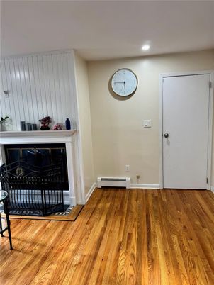 Fireplace, Interior, Recessed Lighting, Wood Texture Flooring