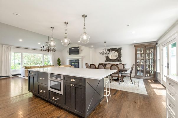 Chandelier, Dining room, Fireplace, Interior, Kitchen, Pendant Lights, Recessed Lighting, Wood Texture Flooring