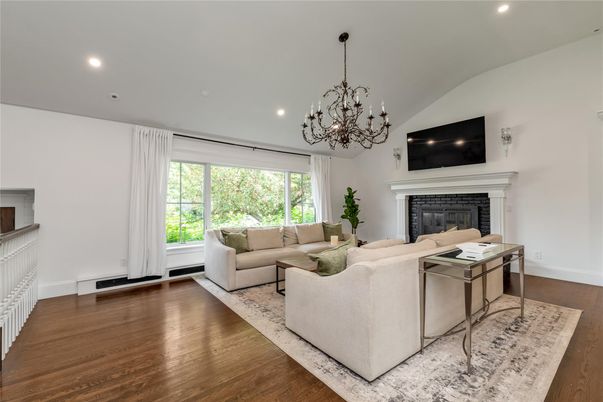 Chandelier, Fireplace, Interior, Living room, Recessed Lighting, Wood Texture Flooring
