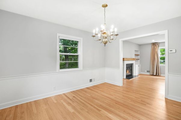 Chandelier, Empty room, Fireplace, Interior, Recessed Lighting, Wood Texture Flooring