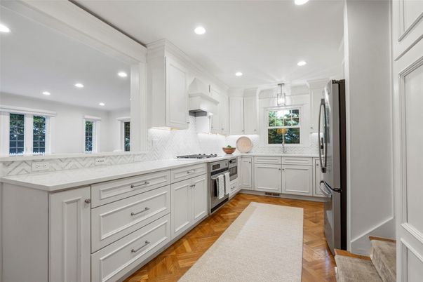 Interior, Kitchen, Marble Walls, Pendant Lights, Recessed Lighting, Stainless Steel Appliances, Wood Texture Flooring