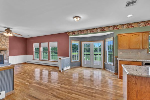 Empty room, Fireplace, Interior, Kitchen, Recessed Lighting, Wood Texture Flooring