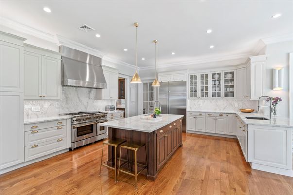 Interior, Kitchen, Marble Walls, Pendant Lights, Recessed Lighting, Stainless Steel Appliances, Wood Texture Flooring