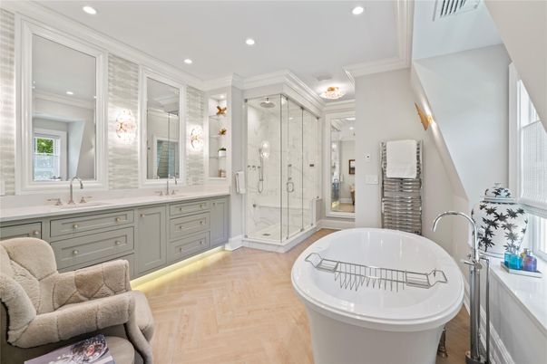 Bathroom, Dual Sink Vanities, Free Standing Baths, Glass Shower, Interior, Recessed Lighting, Wood Texture Flooring