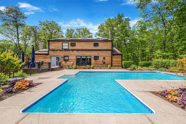 Exterior, Pool, Solar Panels