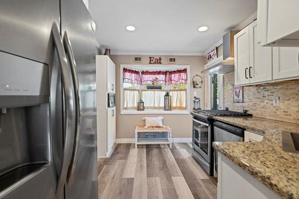Interior, Kitchen, Recessed Lighting, Stainless Steel Appliances, Wood Texture Flooring
