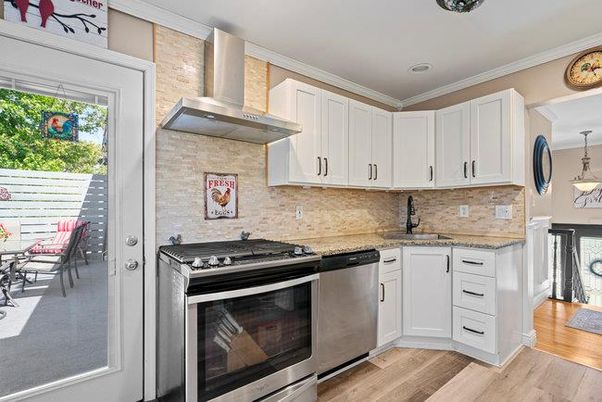 Interior, Kitchen, Pendant Lights, Recessed Lighting, Stainless Steel Appliances, Stone Walls, Wood Texture Flooring